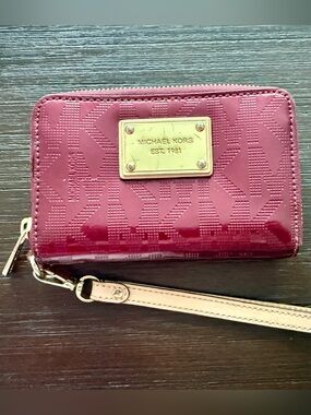 Michael Kors Burgundy Patent Leather Wristlet with Gold Plaque